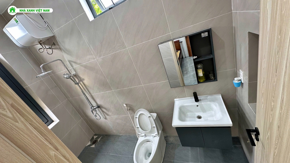 Mẫu nhà cấp 4 mái Nhật đẹp 9.3x17m NCB-202502 107 Hoàn thiện phòng WC 2- view 2