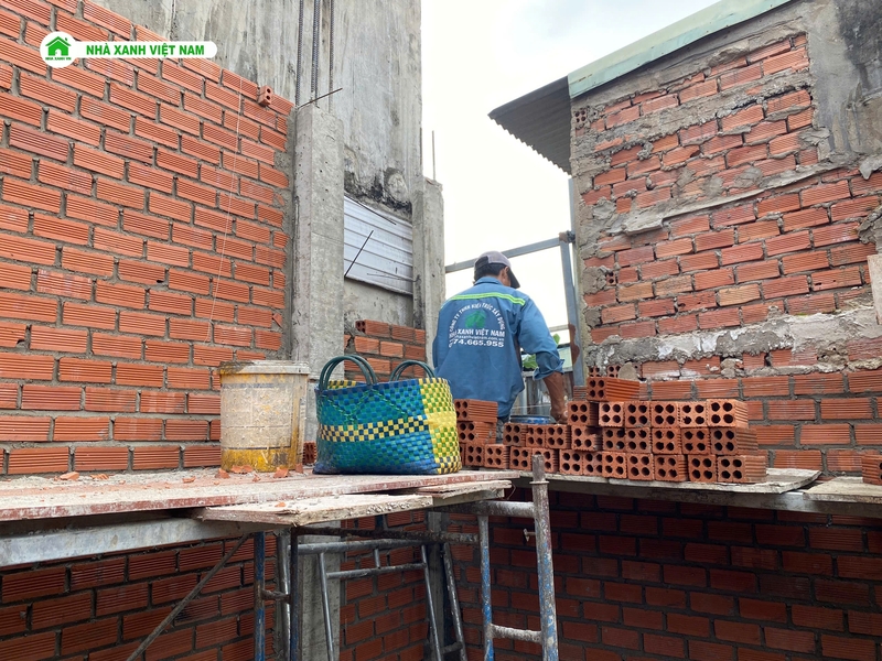 Mẫu nhà 1 trệt 1 lầu mái Nhật 6x16,5m 3 phòng ngủ NP2T-NX-11 57 Công tác thi công tường gạch